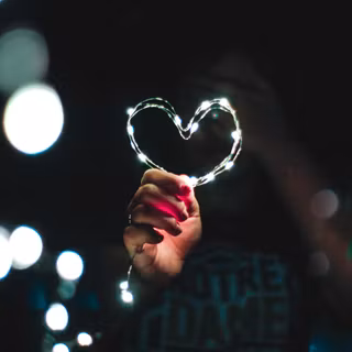 Heart in hand wallpaper
