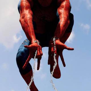 Spider-Man swinging wallpaper