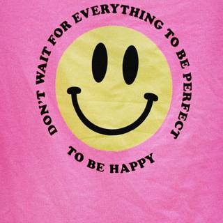 Pink smiley face wallpaper