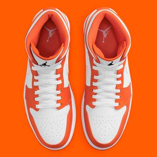 White and orange Air Jordans wallpaper