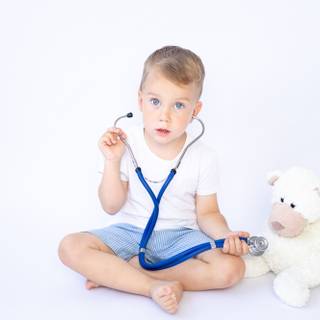 Baby with stethoscope wallpaper