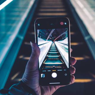 Holding phone wallpaper