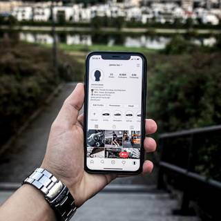 Holding phone wallpaper