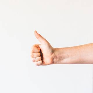 Thumbs up and thumbs down wallpaper