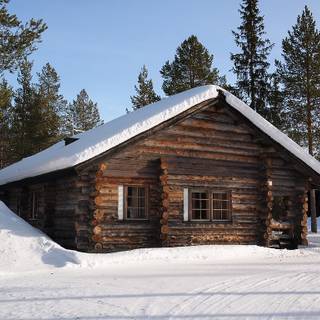 Romantic winter cabin wallpaper