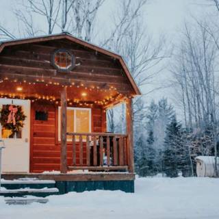 Romantic winter cabin wallpaper