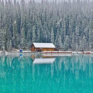 Romantic winter cabin wallpaper