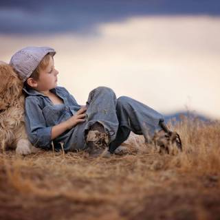 Dog and boy wallpaper