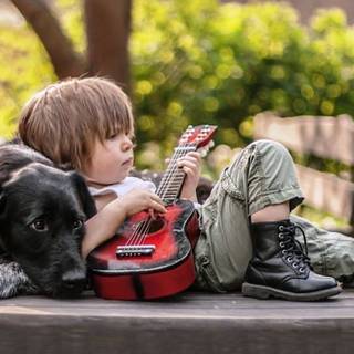 Dog and boy wallpaper