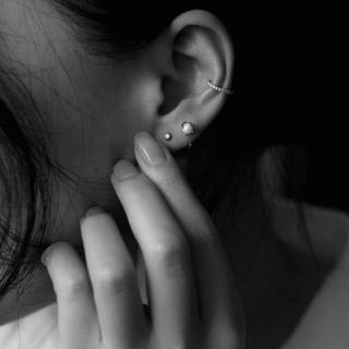 Ear piercing wallpaper