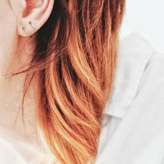 Ear piercing wallpaper