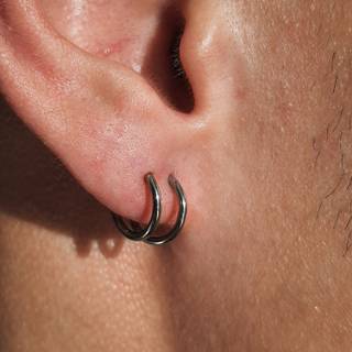 Ear piercing wallpaper