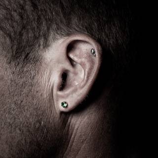 Ear piercing wallpaper