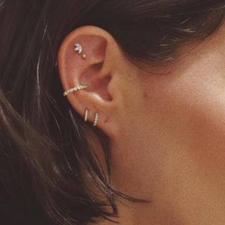 Ear piercing wallpaper