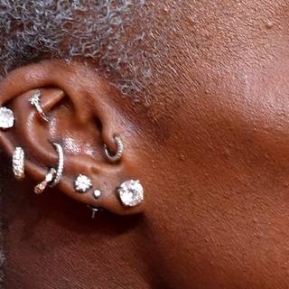 Ear piercing wallpaper
