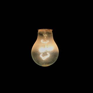 Light bulb glowing Ultra HD wallpaper