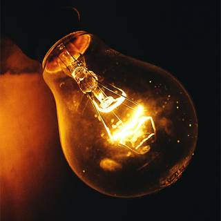 Light bulb glowing Ultra HD wallpaper