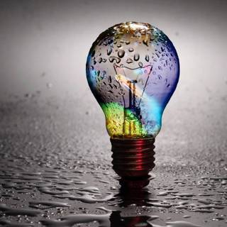 Light bulb glowing Ultra HD wallpaper