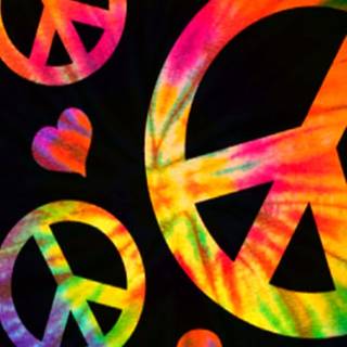 Tie-dye peace signs wallpaper