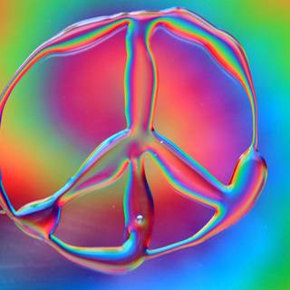 Tie-dye peace signs wallpaper