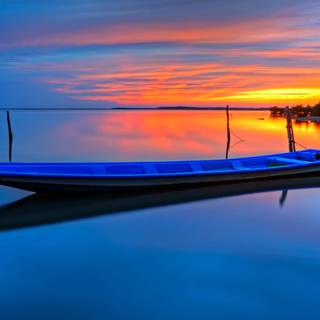 Pretty sunset boat wallpaper