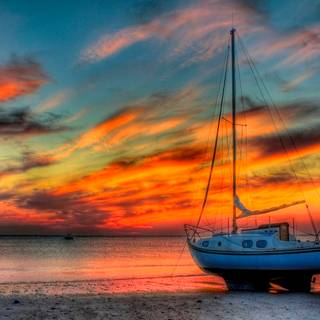 Pretty sunset boat wallpaper