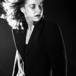 Girl in suit wallpaper