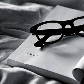 Book with glasses wallpaper