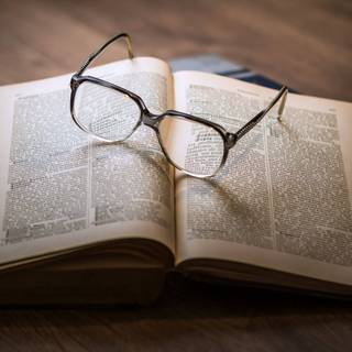 Book with glasses wallpaper