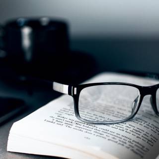 Book with glasses wallpaper