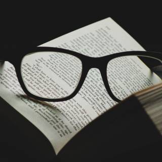 Book with glasses wallpaper