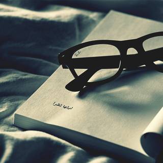 Book with glasses wallpaper