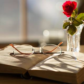 Book with glasses wallpaper