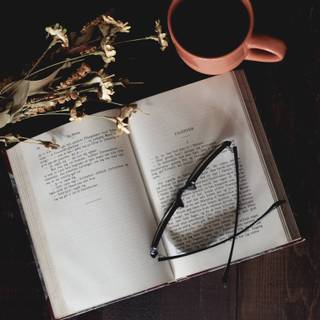 Book with glasses wallpaper