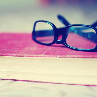 Book with glasses wallpaper