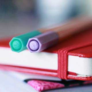 Pen and book wallpaper