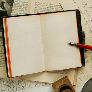 Pen and book wallpaper