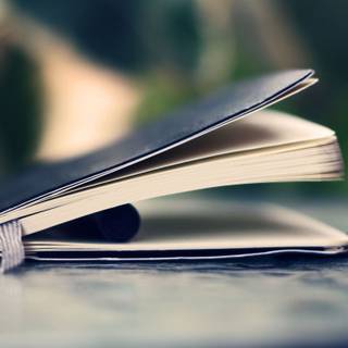 Pen and book wallpaper