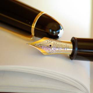 Pen and book wallpaper