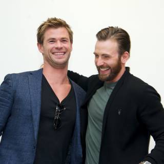 Chris Evans and Chris Hemsworth wallpaper