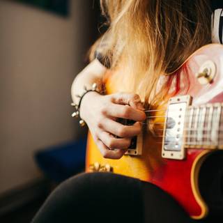 iPhone 13 Pro Max guitar wallpaper