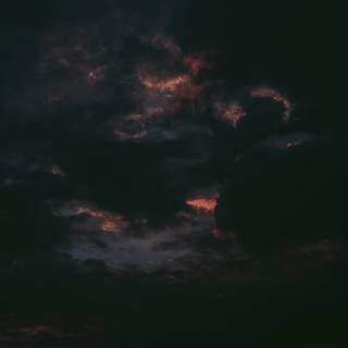 iPhone black clouds wallpaper