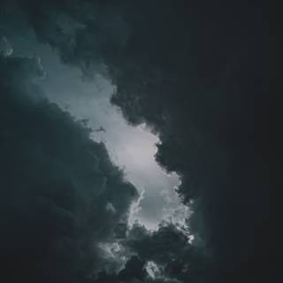 iPhone black clouds wallpaper