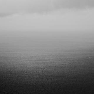 iPhone black clouds wallpaper