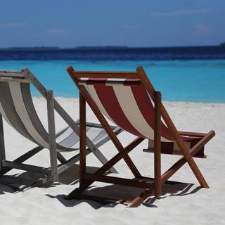 Summer beach chairs wallpaper