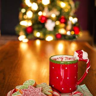 Hot chocolate with a Christmas tree wallpaper