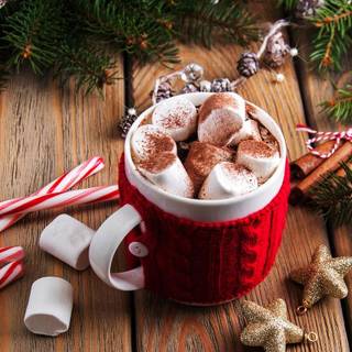 Hot chocolate with a Christmas tree wallpaper