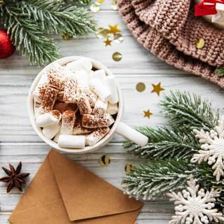 Hot chocolate with a Christmas tree wallpaper