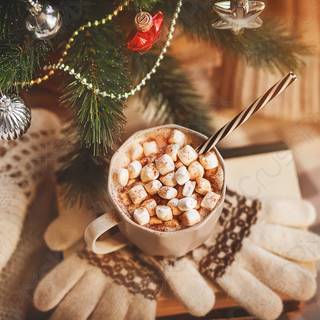 Hot chocolate with a Christmas tree wallpaper