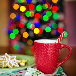 Hot chocolate with a Christmas tree wallpaper